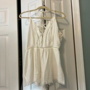 One piece shorts and tie front spaghetti strap top